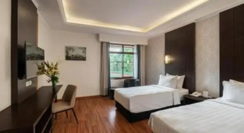 Bed in Bentani Hotel & Residence Bed in Bentani Hotel & Residence