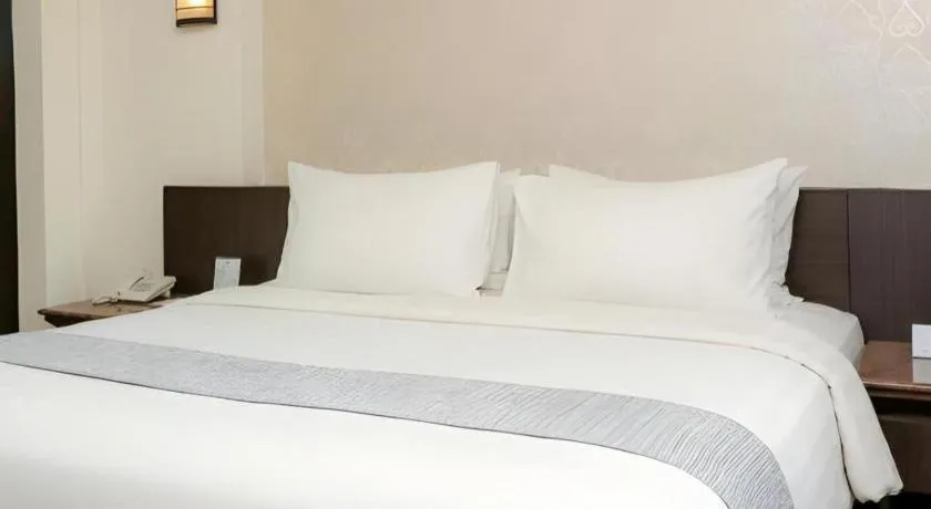 Bed in Bentani Hotel & Residence