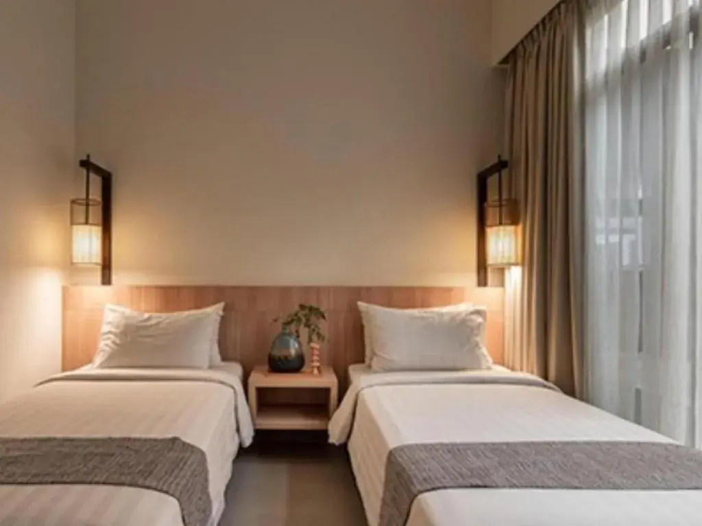 Bed in Bentani Hotel & Residence Bed in Bentani Hotel & Residence