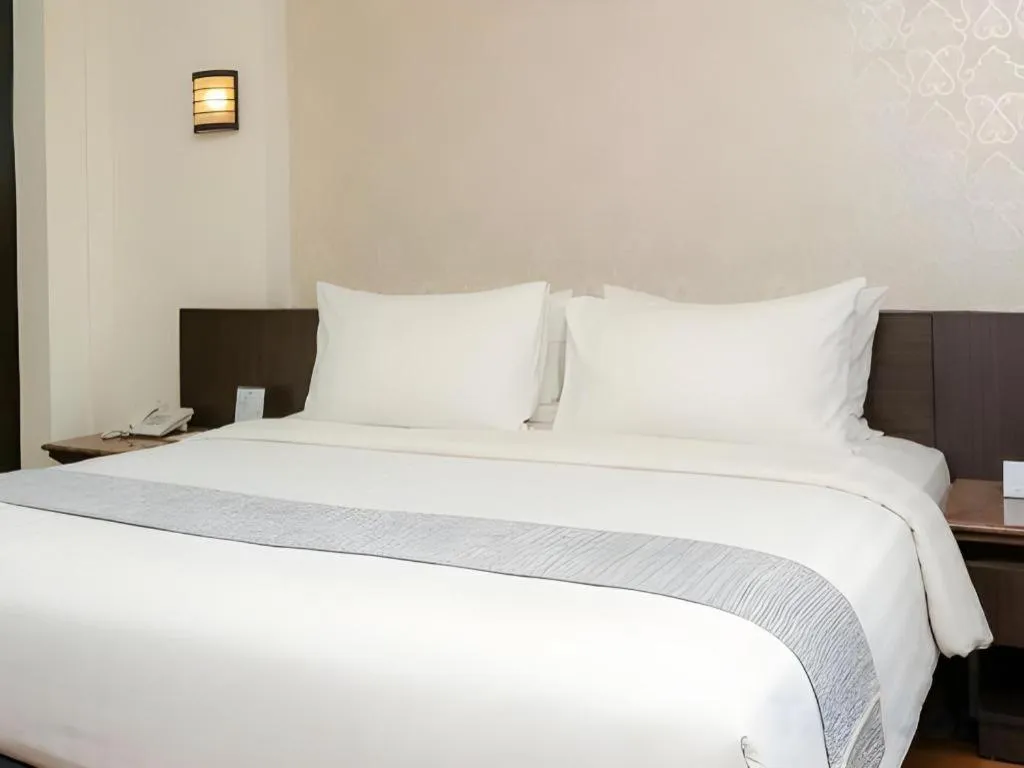 Bed in Bentani Hotel & Residence