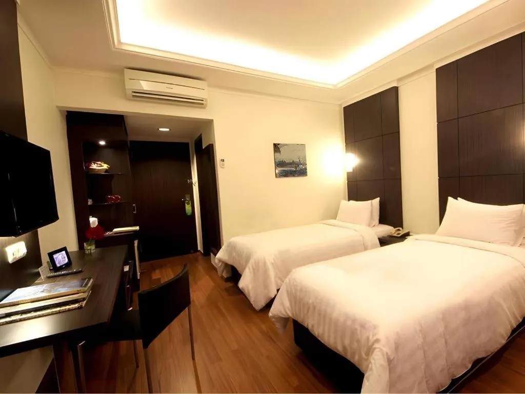 Bed in Bentani Hotel & Residence