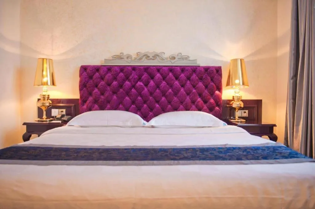 Bed in Guilin Sapphire hotel