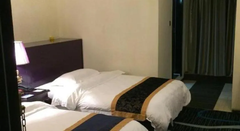 Bed in Guilin Sapphire hotel