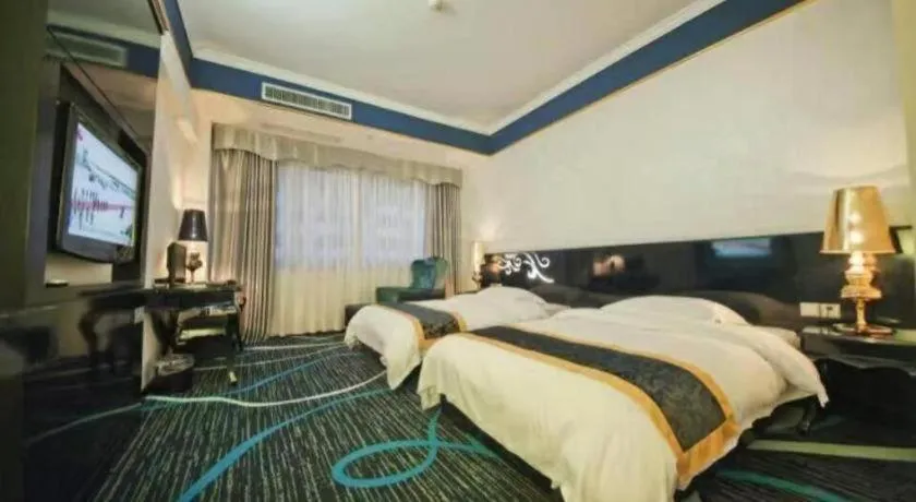 Bed in Guilin Sapphire hotel