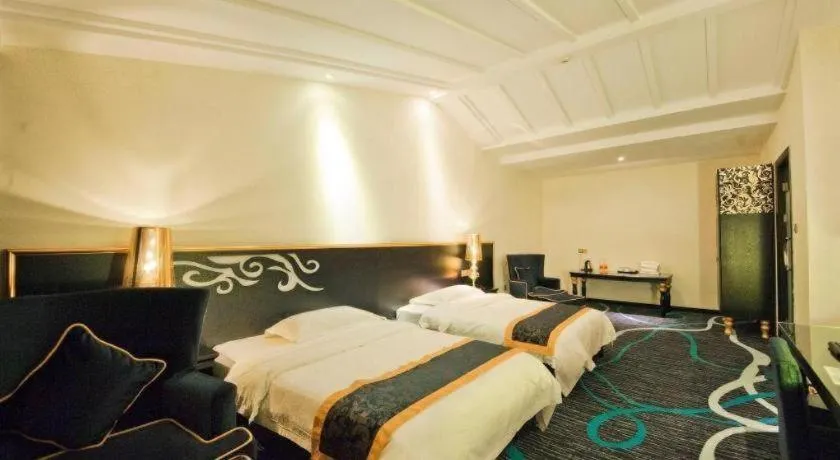 Bed in Guilin Sapphire hotel