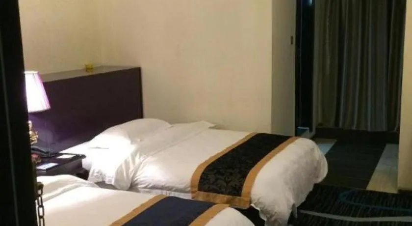 Bed in Guilin Sapphire hotel