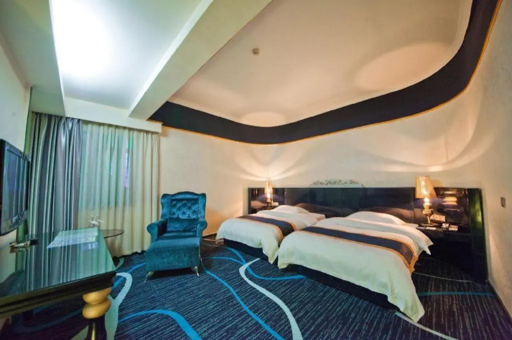 Bed in Guilin Sapphire hotel