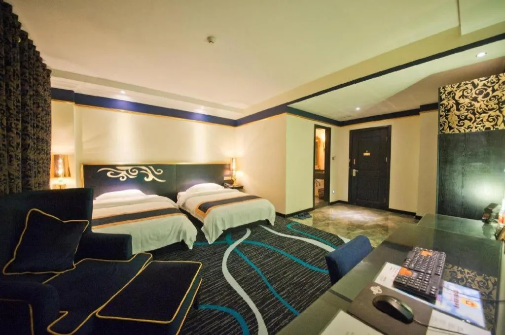 Bed in Guilin Sapphire hotel