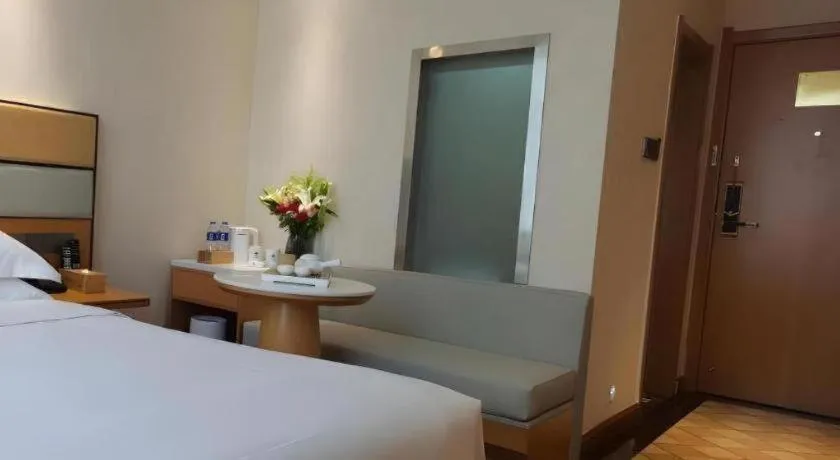 Bed in GreenTree Inn Geermu Walking Street Business Hotel