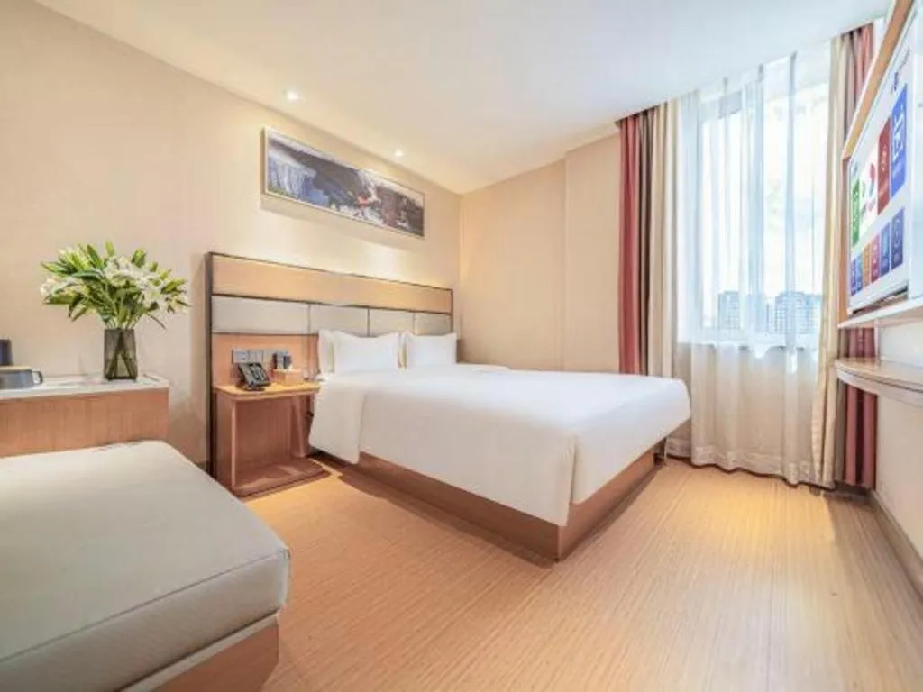 Bed in GreenTree Inn Geermu Walking Street Business Hotel