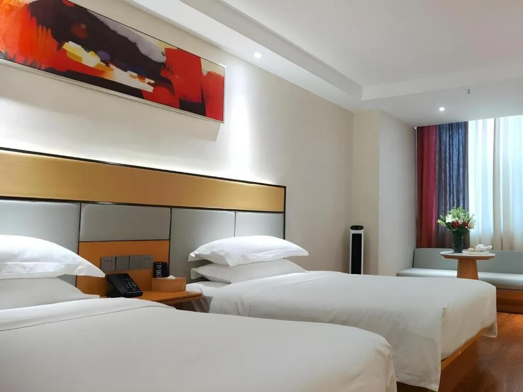 Bed in GreenTree Inn Geermu Walking Street Business Hotel