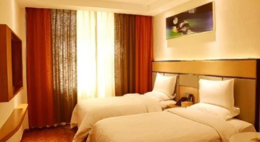 Bed in GreenTree Inn Geermu Walking Street Business Hotel