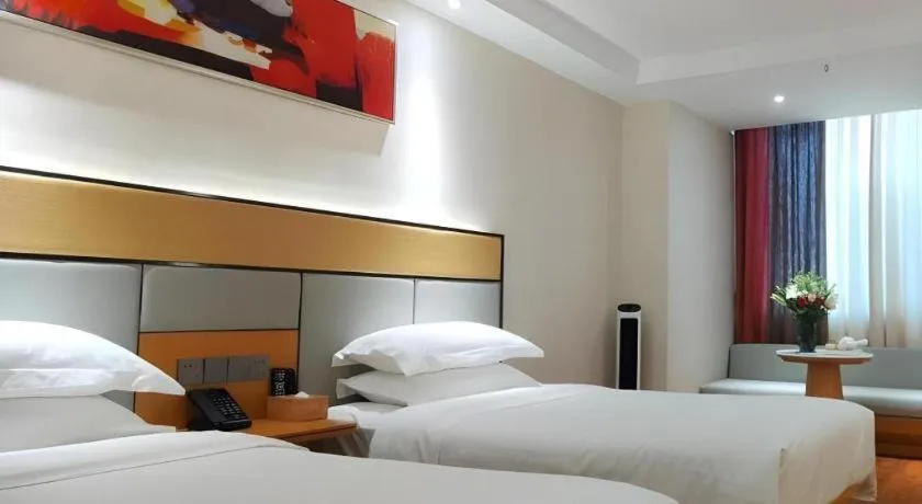 Bed in GreenTree Inn Geermu Walking Street Business Hotel