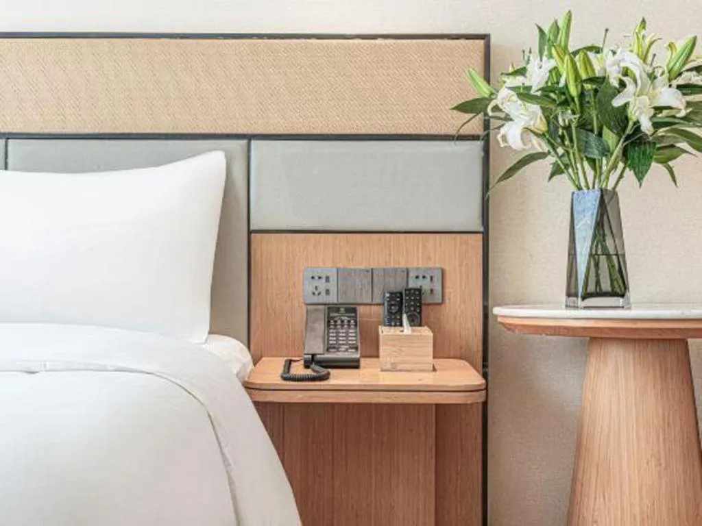 Bed in GreenTree Inn Geermu Walking Street Business Hotel