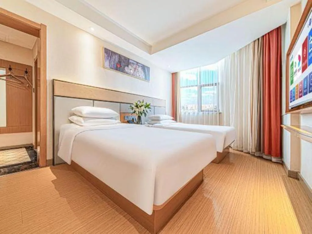 Bed in GreenTree Inn Geermu Walking Street Business Hotel