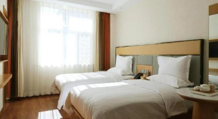 Bed in GreenTree Inn Geermu Walking Street Business Hotel