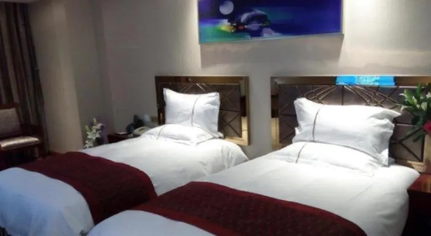 Bed in GreenTree Inn Geermu Walking Street Business Hotel