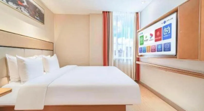 Bed in GreenTree Inn Geermu Walking Street Business Hotel