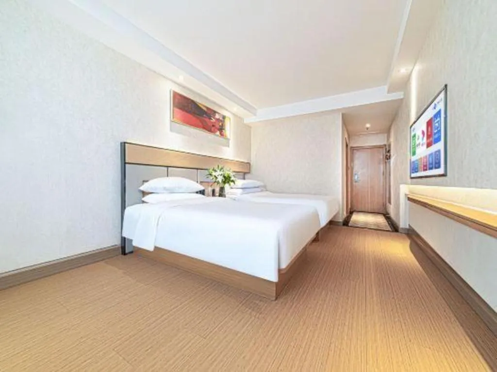 Bed in GreenTree Inn Geermu Walking Street Business Hotel