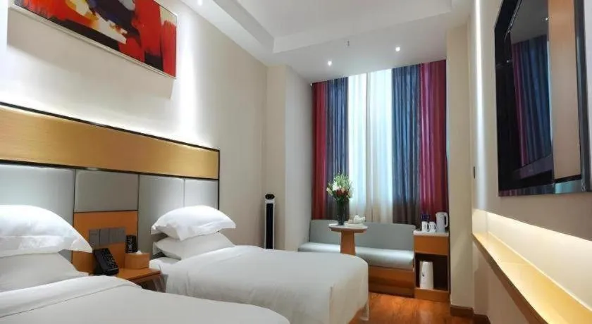 Bed in GreenTree Inn Geermu Walking Street Business Hotel