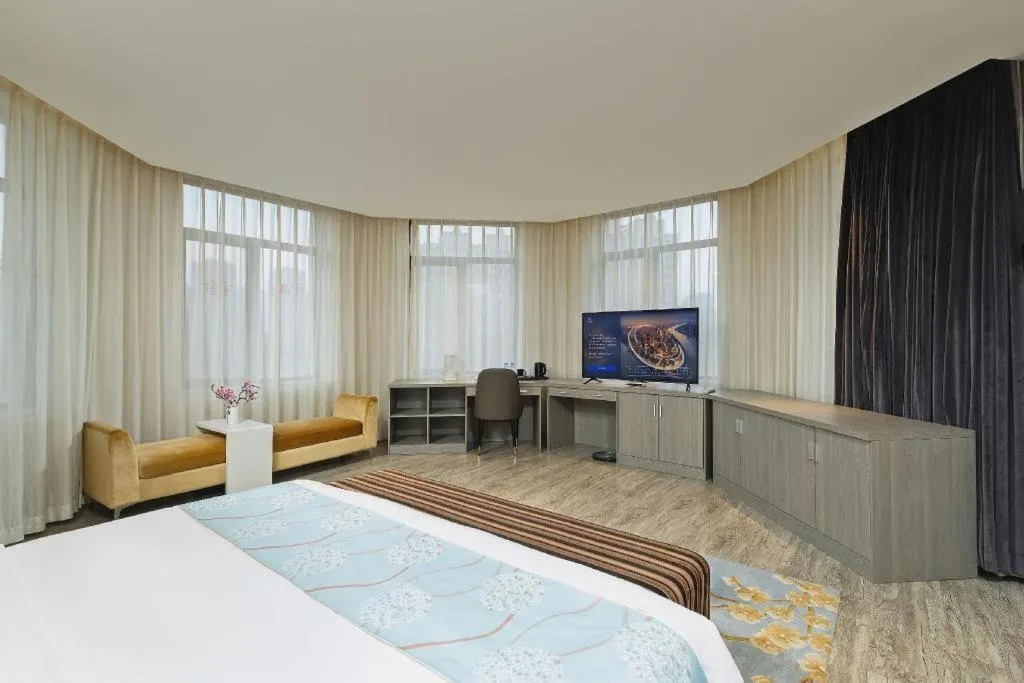 Bed in Jinjiang Metropolo Hotel Shenyang Country Garden Datong Lake Subway Station Branch