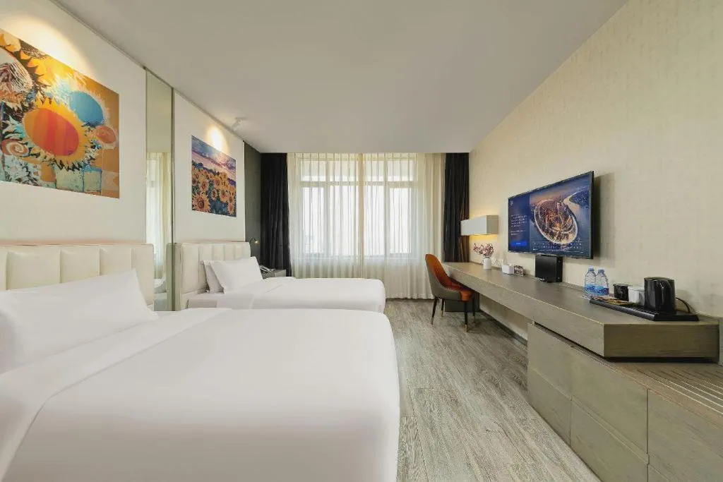 Bed in Jinjiang Metropolo Hotel Shenyang Country Garden Datong Lake Subway Station Branch
