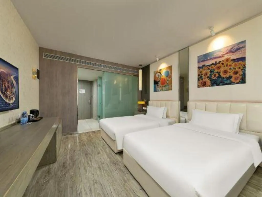 Bed in Jinjiang Metropolo Hotel Shenyang Country Garden Datong Lake Subway Station Branch