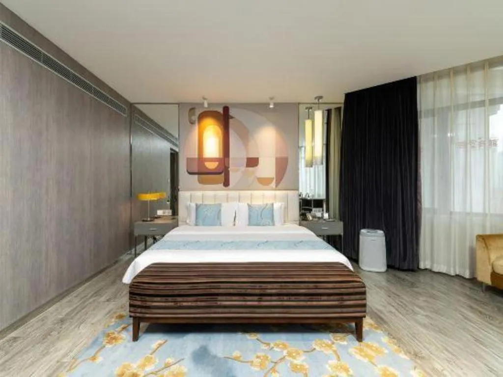 Bed in Jinjiang Metropolo Hotel Shenyang Country Garden Datong Lake Subway Station Branch