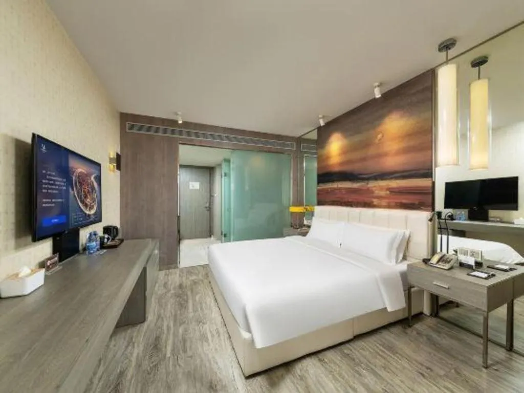 Bed in Jinjiang Metropolo Hotel Shenyang Country Garden Datong Lake Subway Station Branch