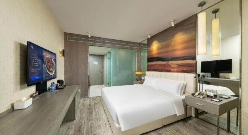 Bed in Jinjiang Metropolo Hotel Shenyang Country Garden Datong Lake Subway Station Branch