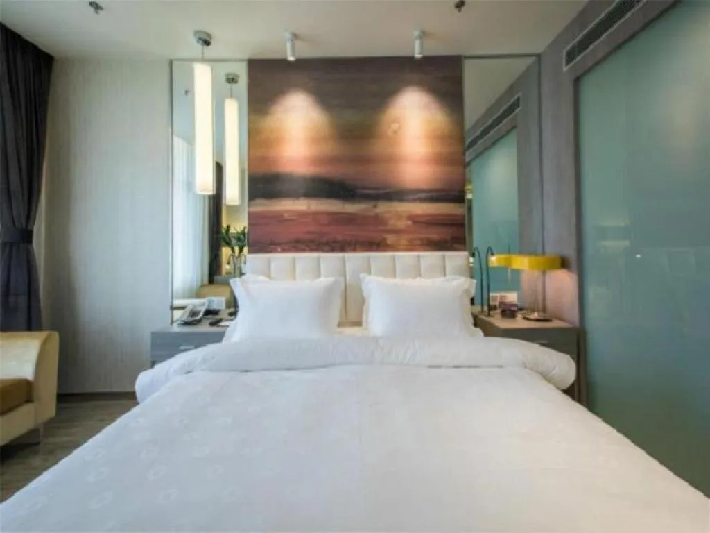 Bed in Jinjiang Metropolo Hotel Shenyang Country Garden Datong Lake Subway Station Branch