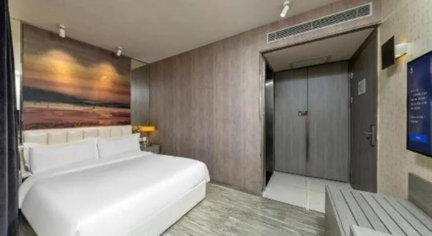 Bed in Jinjiang Metropolo Hotel Shenyang Country Garden Datong Lake Subway Station Branch
