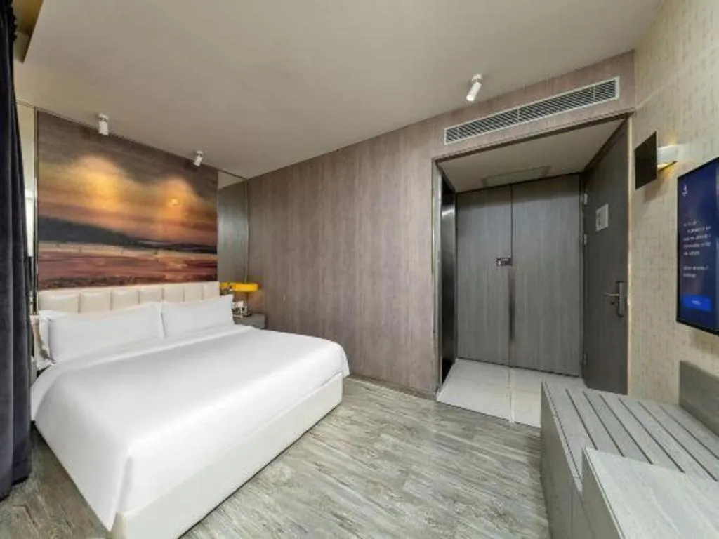 Bed in Jinjiang Metropolo Hotel Shenyang Country Garden Datong Lake Subway Station Branch