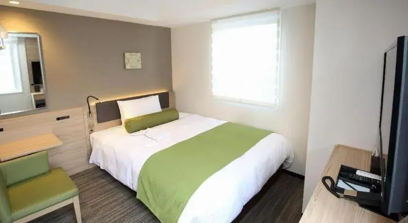 Bed in KEIKYU EX INN Hamamatsucho Daimon-Station (Tokyo) Bed in KEIKYU EX INN Hamamatsucho Daimon-Station (Tokyo)