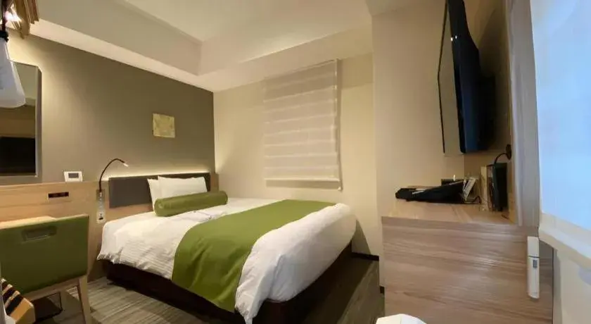 Bed in KEIKYU EX INN Hamamatsucho Daimon-Station (Tokyo) Bed in KEIKYU EX INN Hamamatsucho Daimon-Station (Tokyo)