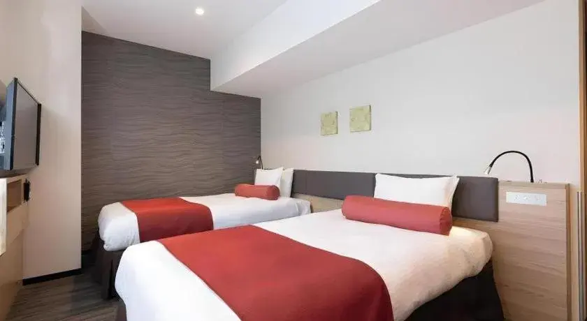 Bed in KEIKYU EX INN Hamamatsucho Daimon-Station (Tokyo) Bed in KEIKYU EX INN Hamamatsucho Daimon-Station (Tokyo)