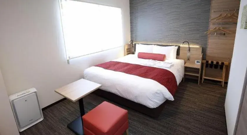 Bed in KEIKYU EX INN Hamamatsucho Daimon-Station (Tokyo) Bed in KEIKYU EX INN Hamamatsucho Daimon-Station (Tokyo)