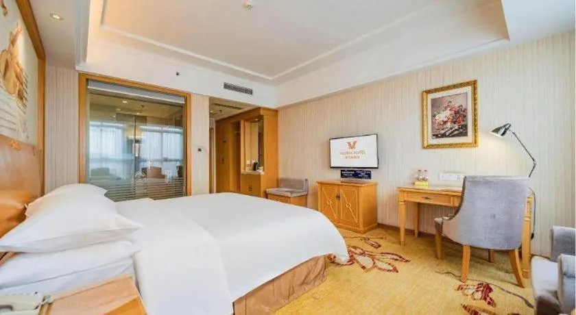 Bed in Vienna Hotel Chengdu Xinfan Furniture City