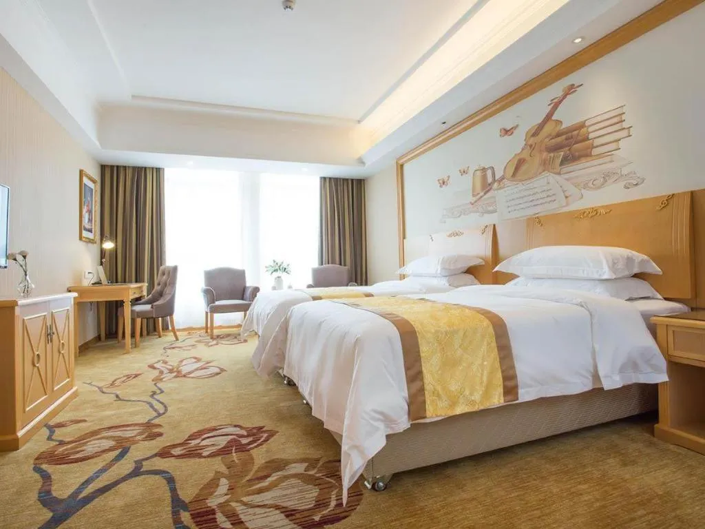 Bed in Vienna Hotel Chengdu Xinfan Furniture City