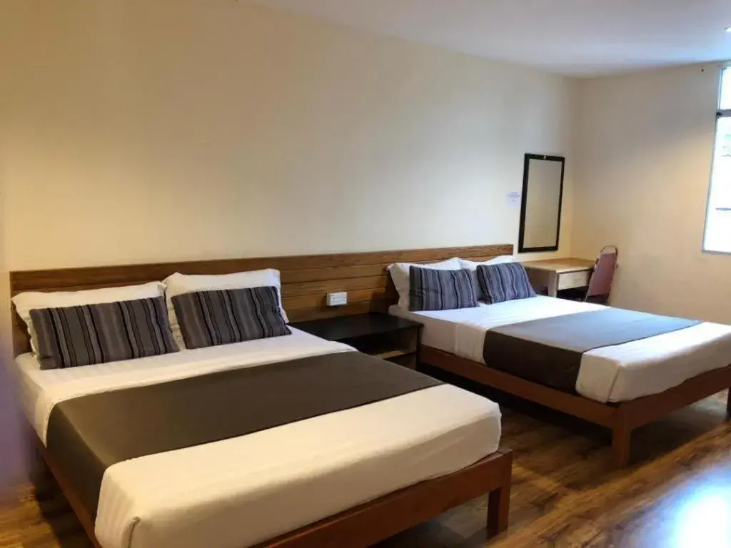 Bed in Hotel Sarina Bed in Hotel Sarina