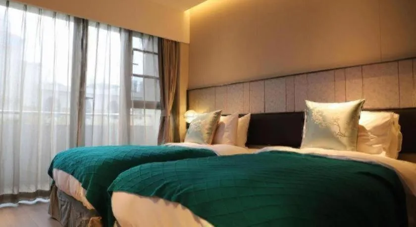 Bed in Ethos Hotel Wuhan Riverside