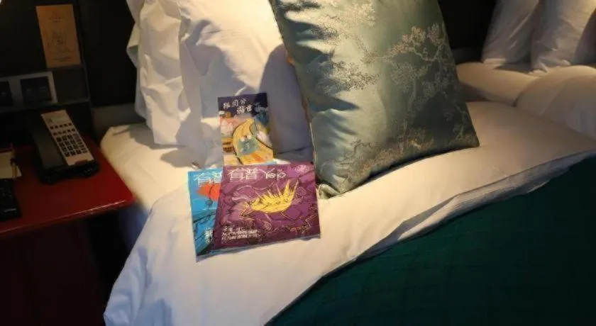 Bed in Ethos Hotel Wuhan Riverside