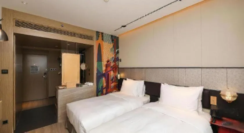 Bed in Ethos Hotel Wuhan Riverside