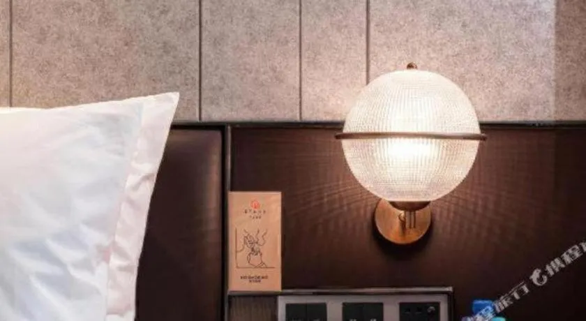 Bed in Ethos Hotel Wuhan Riverside