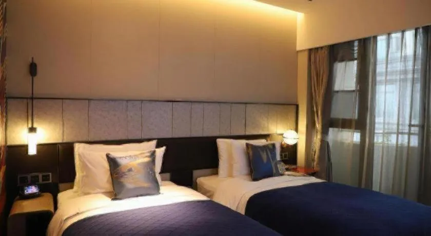 Bed in Ethos Hotel Wuhan Riverside