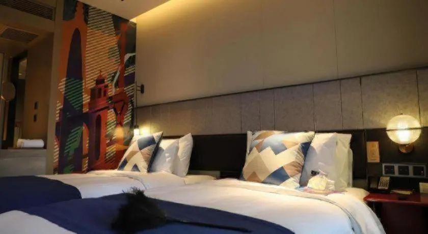 Bed in Ethos Hotel Wuhan Riverside