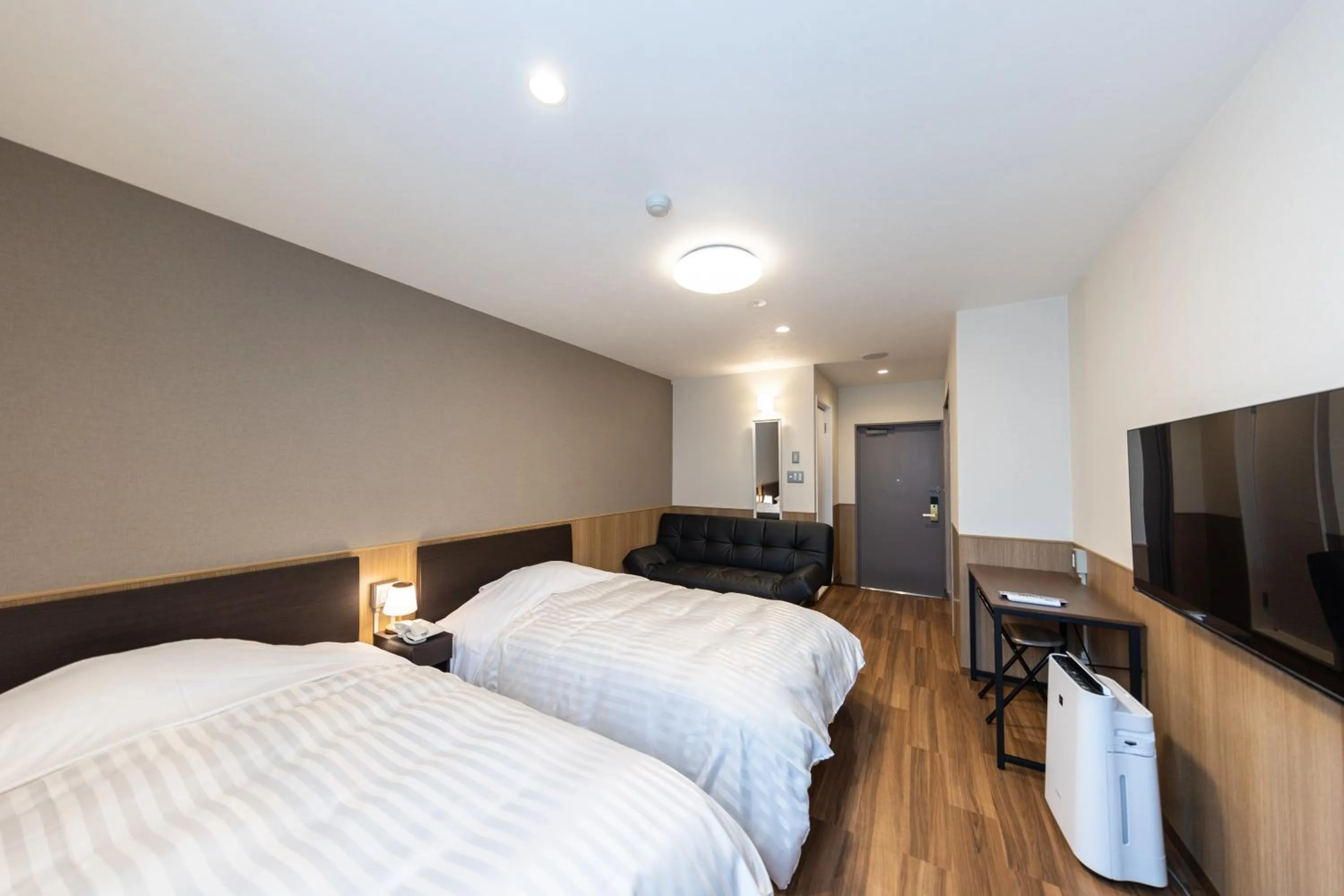 Bed in GARDEN HOTEL Hanayo