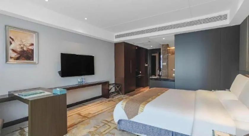 Bed in Santavan Hotel Shenzhen Guangming