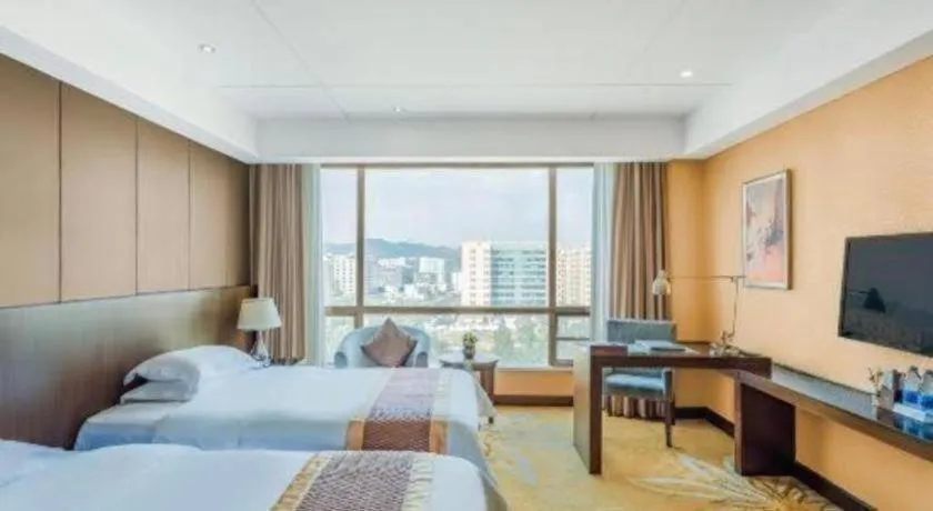 Bed in Santavan Hotel Shenzhen Guangming