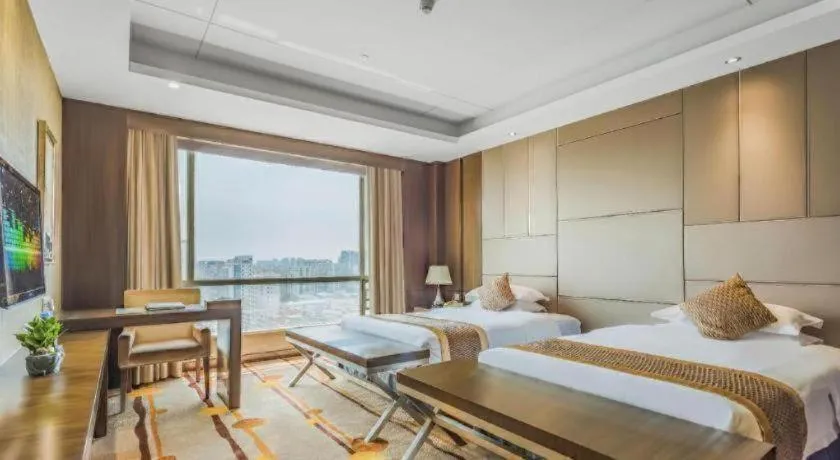 Bed in Santavan Hotel Shenzhen Guangming